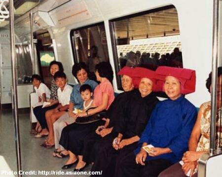 samsui women in mrt train on opening day 1987